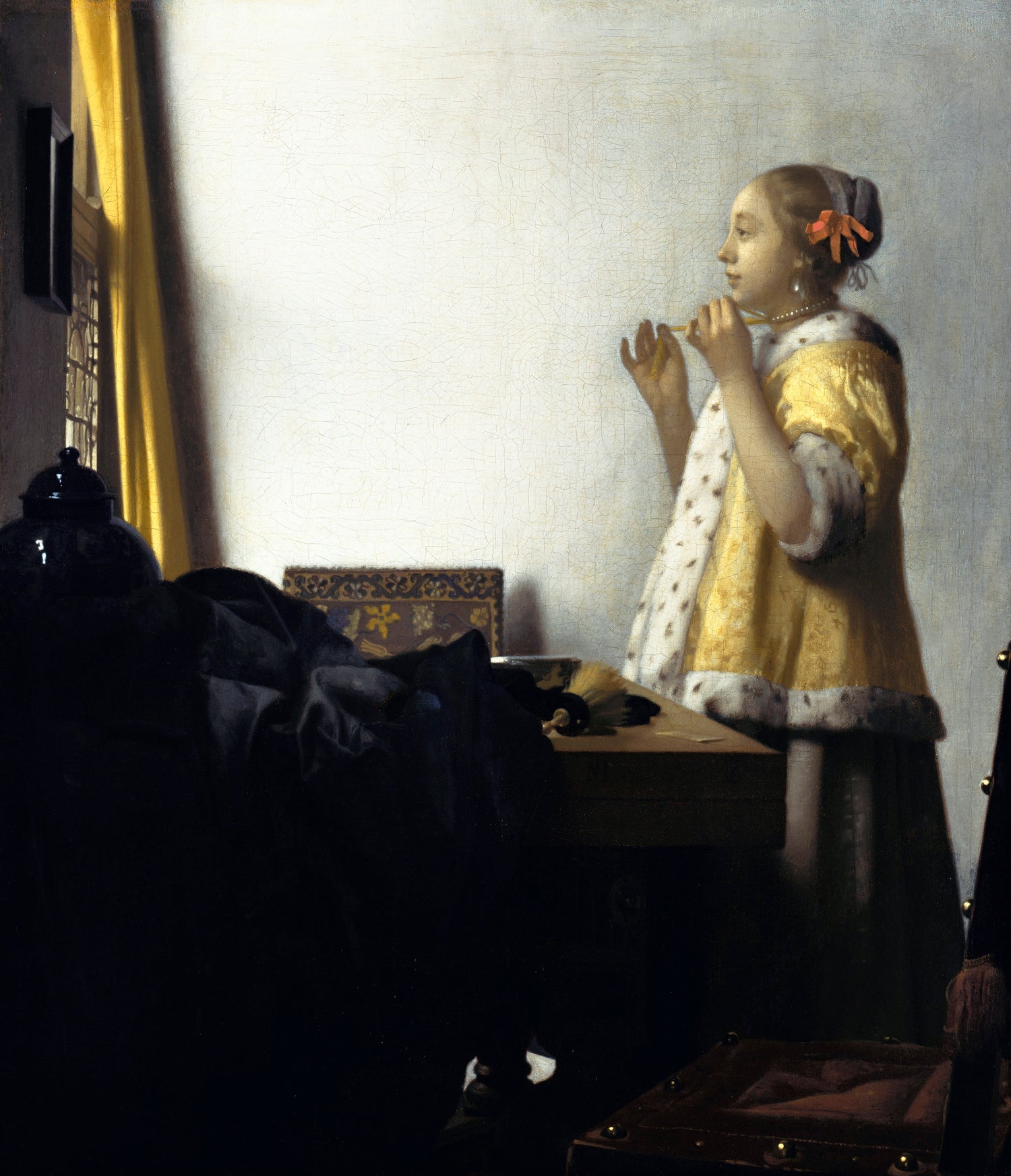 Young Woman with a Pearl Necklace (ca. 1663-1665) by Johannes Vermeer