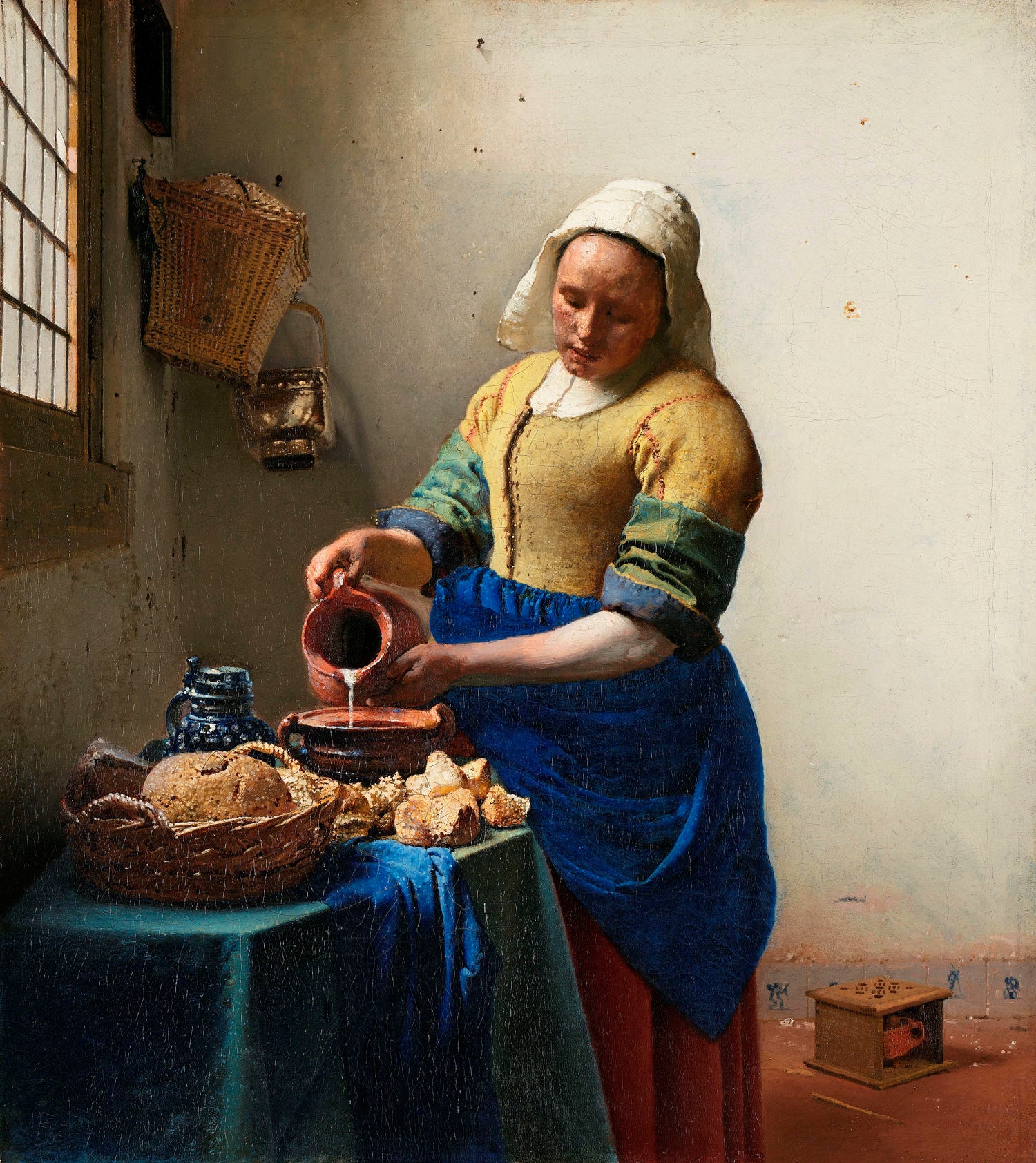 The Milkmaid (ca. 1660) by Johannes Vermeer